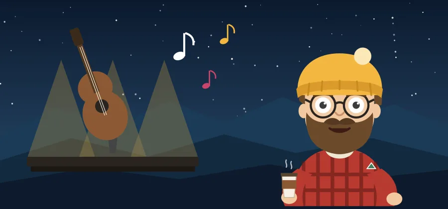 Live music stage with mountains behind it